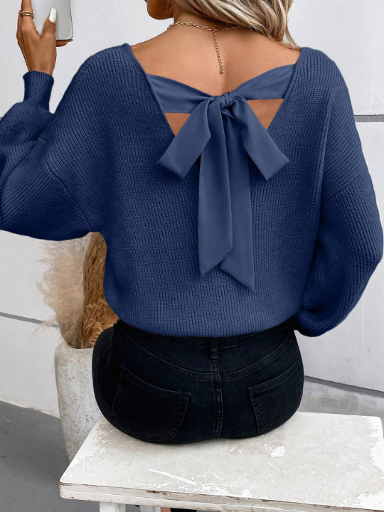 Frenchy Solid Color Knitted Sweater With Back Knot And Drop Shoulder Design