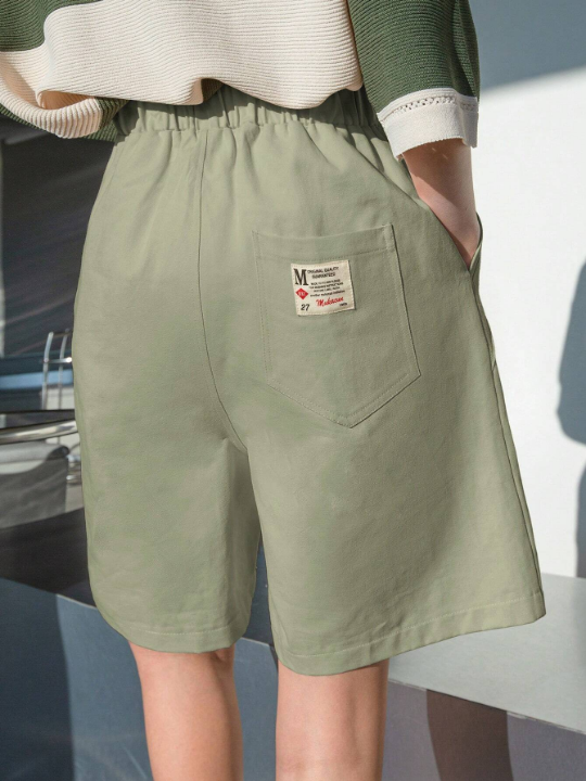 DAZY Letter Patched Slant Pockets Shorts