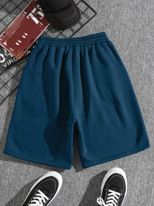 Men Drawstring Waist Slant Pocket Shorts