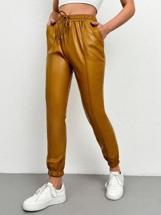 Solid Color Drawstring Waist Tapered Pants