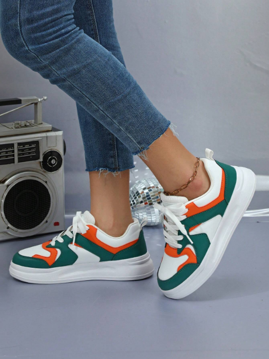 Stylish White Green Orange Colorblock Comfortable Outdoor Skate Shoes With Lace-Up Closure, Round Toe And Low Top Design, Perfect Gift For Sporty And Girly Ladies On Festival