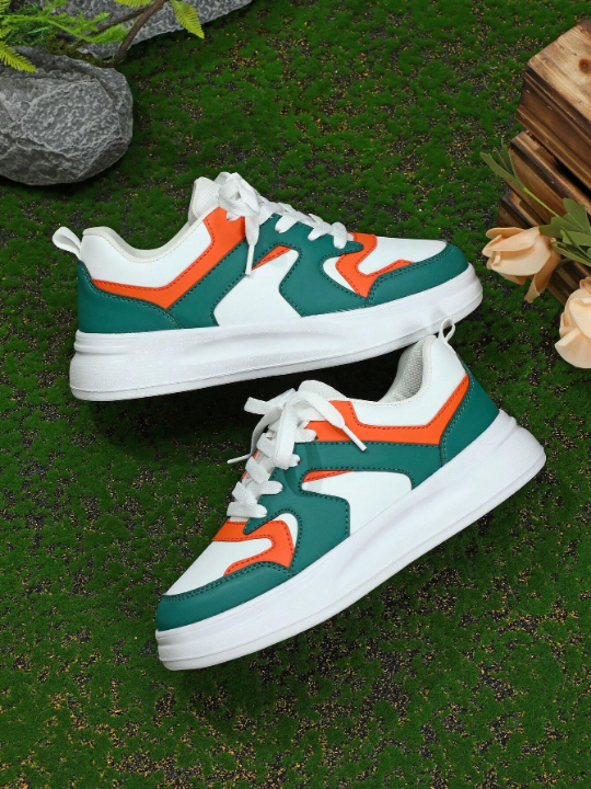 Stylish White Green Orange Colorblock Comfortable Outdoor Skate Shoes With Lace-Up Closure, Round Toe And Low Top Design, Perfect Gift For Sporty And Girly Ladies On Festival