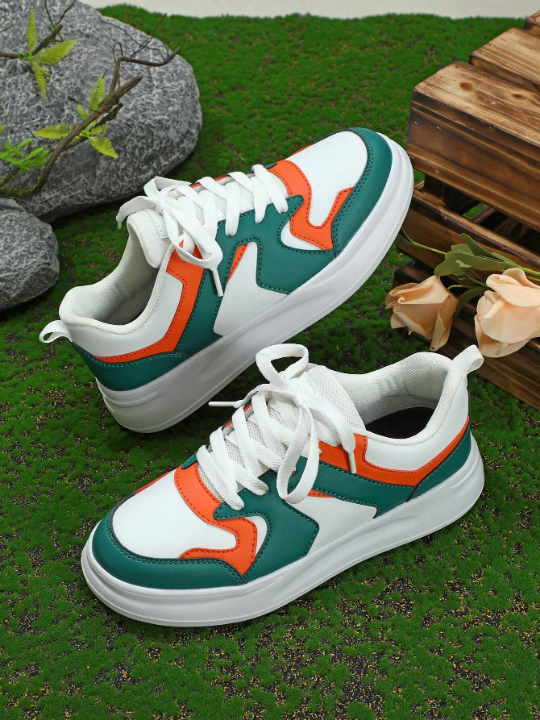 Stylish White Green Orange Colorblock Comfortable Outdoor Skate Shoes With Lace-Up Closure, Round Toe And Low Top Design, Perfect Gift For Sporty And Girly Ladies On Festival