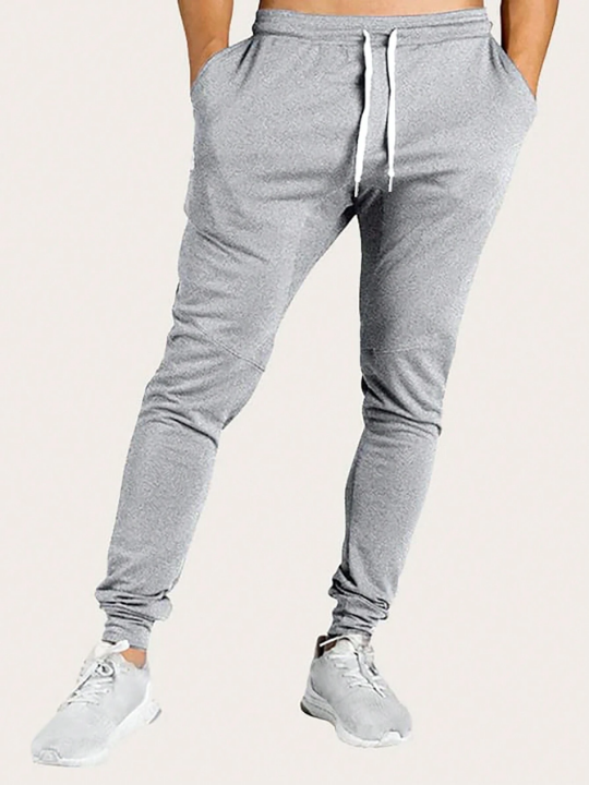 Manfinity Sporsity Men's Casual Jogger Pants With Patchwork And Weaved Belt Detail