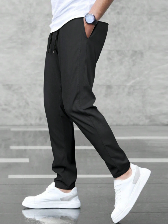 Manfinity Basics Men Solid Drawstring Waist Pants