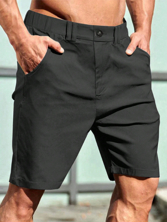 Manfinity Homme Men's Solid Color Casual Elastic Waist Shorts