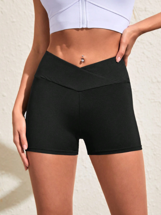 Ladies' Solid Color Asymmetrical Waist Running Shorts