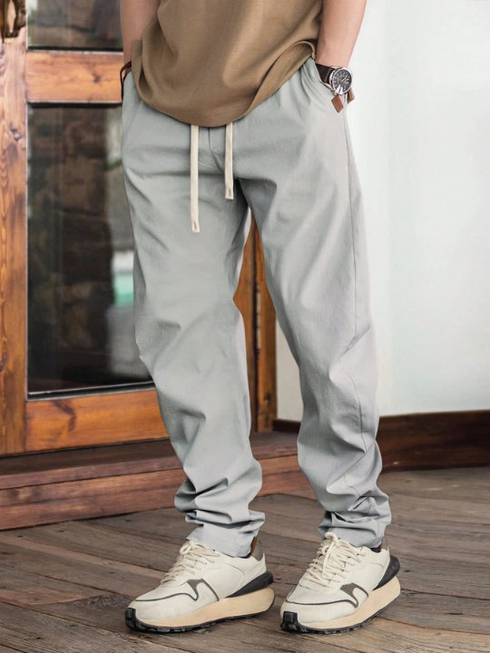 Manfinity Homme Waist Drawstring Pocket Solid Color Long Pants