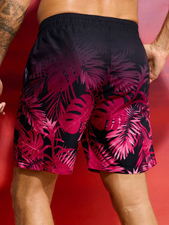 Manfinity Swimmode Men's Tropical Plant Printed Beach Shorts