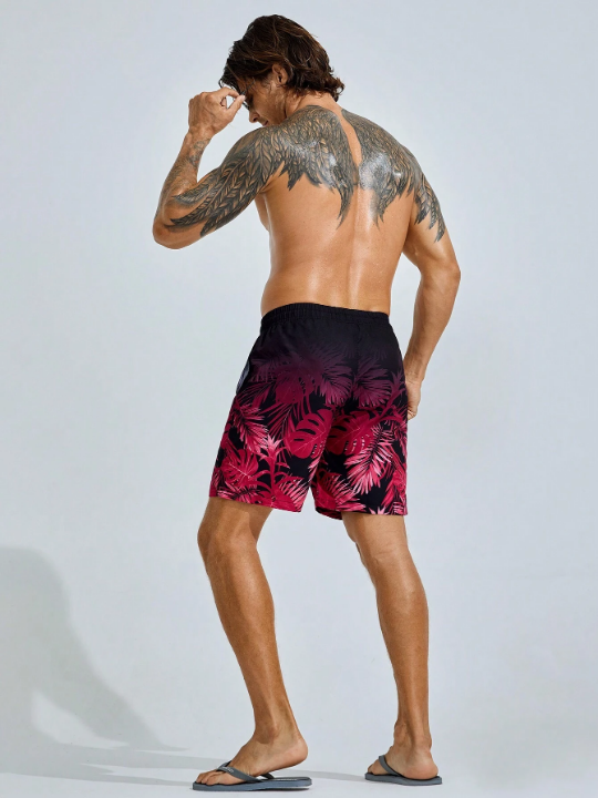 Manfinity Swimmode Men's Tropical Plant Printed Beach Shorts