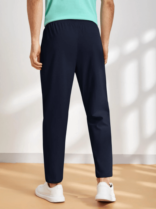 Manfinity Basics Men Solid Drawstring Waist Pants - Lolli World Marketplace