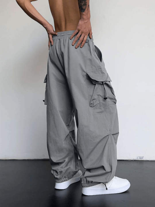 Manfinity EMRG Men Solid Flap Pocket Drawstring Waist Oversized Cargo Pants - Lolli World Marketplace
