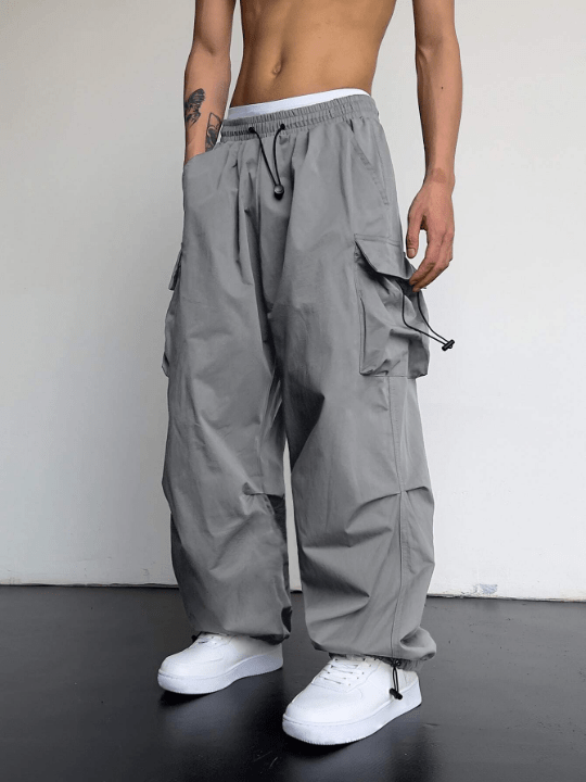 Manfinity EMRG Men Solid Flap Pocket Drawstring Waist Oversized Cargo Pants - Lolli World Marketplace