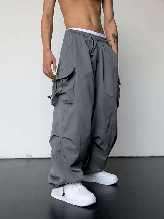 Manfinity EMRG Men Solid Flap Pocket Drawstring Waist Oversized Cargo Pants - Lolli World Marketplace