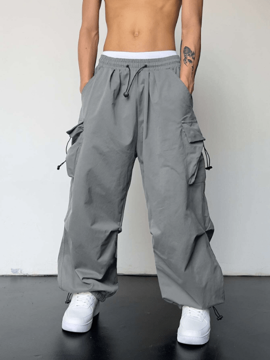 Manfinity EMRG Men Solid Flap Pocket Drawstring Waist Oversized Cargo Pants - Lolli World Marketplace