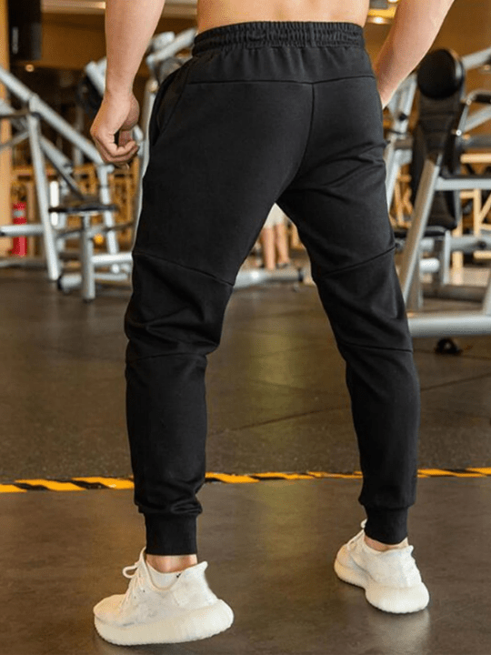Manfinity Homme Men Drawstring Waist Solid Sweatpants - Lolli World Marketplace