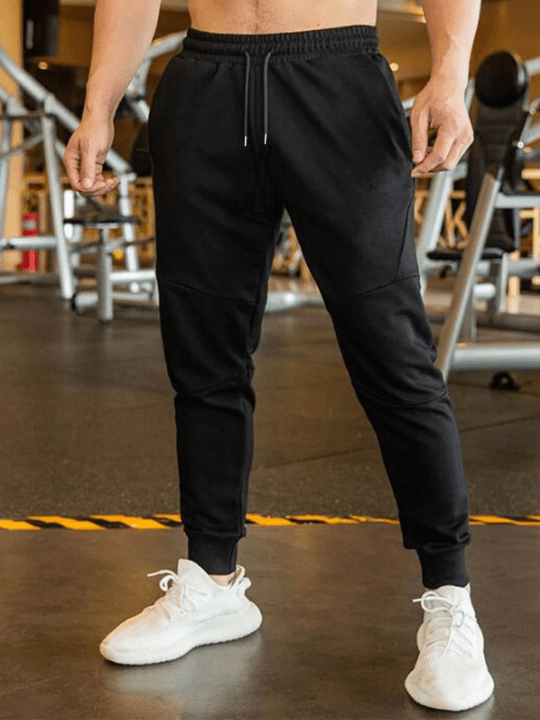 Manfinity Homme Men Drawstring Waist Solid Sweatpants - Lolli World Marketplace