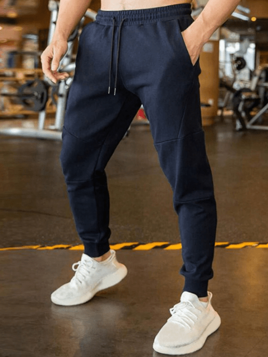 Manfinity Homme Men Solid Drawstring Waist Sweatpants - Lolli World Marketplace