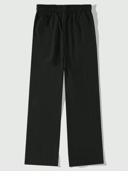 Manfinity Loose Fit Men's Letter Graphic Drawstring Sweatpants With Slant Pockets - Lolli World Marketplace