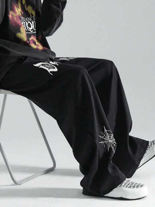 Manfinity Loose Fit Men's Letter Graphic Drawstring Sweatpants With Slant Pockets - Lolli World Marketplace