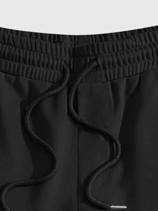 Manfinity Loose Fit Men's Letter Graphic Drawstring Sweatpants With Slant Pockets - Lolli World Marketplace