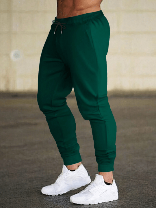 Manfinity Men's Solid Color Drawstring Waist Pants - Lolli World Marketplace