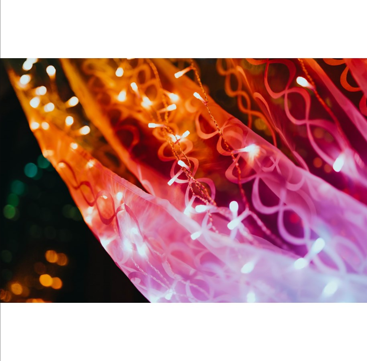 Twinkly Curtain “ 210 App-controlled 210 RGB + Warm White LEDs. 1.5 x 2.1 Meters. Clear Wire.